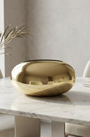 BRASSCO oval golden tissue box combining practical storage with stylish home decor