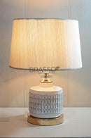 BRC ceramic white FG table lamp with smooth matte finish, elegant minimalist design, and compact size for bedside and modern home ambient lighting