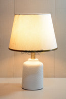 BRC resin small AB table lamp with antique brass finish, elegant decorative design, compact size for bedside and living room ambient lighting