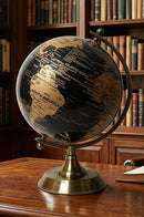 Black and gold FF world globe decor for a modern office desk by BRASSCO