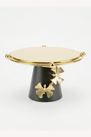 Black and gold serving tray arranged on a dining room console for a sophisticated interior accent