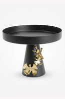 Black butterfly-inspired serving tray styled on a dining room console for elegant entertaining.