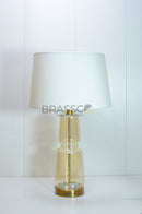 Brassco Champagne Bottle Glass Table Lamp with premium champagne textured glass base and fabric lampshade for luxury home décor.
