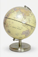 Decorative cream and blue globe for a stylish study table or reading room