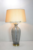 Enhance your interiors with the Smoky Linner Glass Table Lamp, a perfect combination of modern elegance and premium craftsmanship.