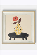 Framed vase painting featured as a decorative accent above a bedroom dresser.