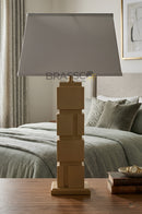 Modern wooden box lamp placed on a table, creating a cozy and elegant atmosphere.