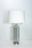 Shop Brassco Smoky Lining Glass Table Lamp featuring premium smoky glass, elegant lining design, fabric lampshade, E27 bulb compatibility, and warm ambient lighting for luxury modern interiors.