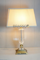 Square long crystal clear table lamp with elegant transparent crystal design, modern luxury lighting for bedroom, living room, side table, and contemporary home décor by Brassco. Inspired by modern crystal lighting styles.