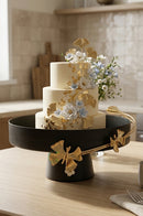  black metal cake tray decor by BRASSCO for modern dining tables