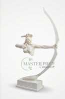 Brown and off-white bow sculptures arranged on separate display shelves in a modern home interior.